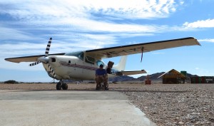 The author next to his Cessna 206. 