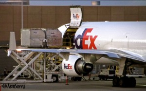 Most freighters (such as the FedEx MD-11 shown above) include an extra large main cargo door. (Photo credit: Flickr)