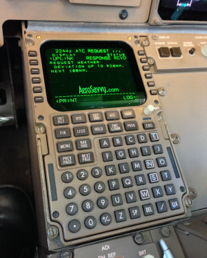 The Flight Management Computer's Control Display Unit (CDU) manages our digital communications.