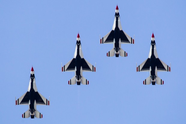 The USAF Thunderbirds transition from take-off, straight into a formation loop. 