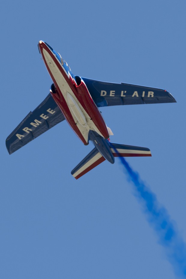One of the jets returns to show center from behind the crowd. 