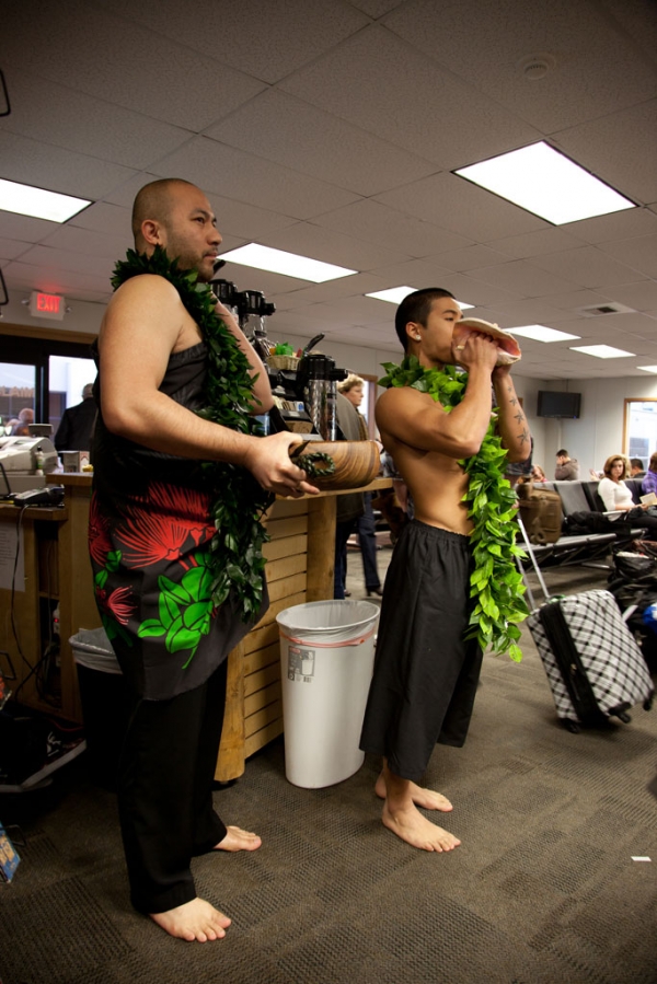 Performing some traditional Hawaiian music.