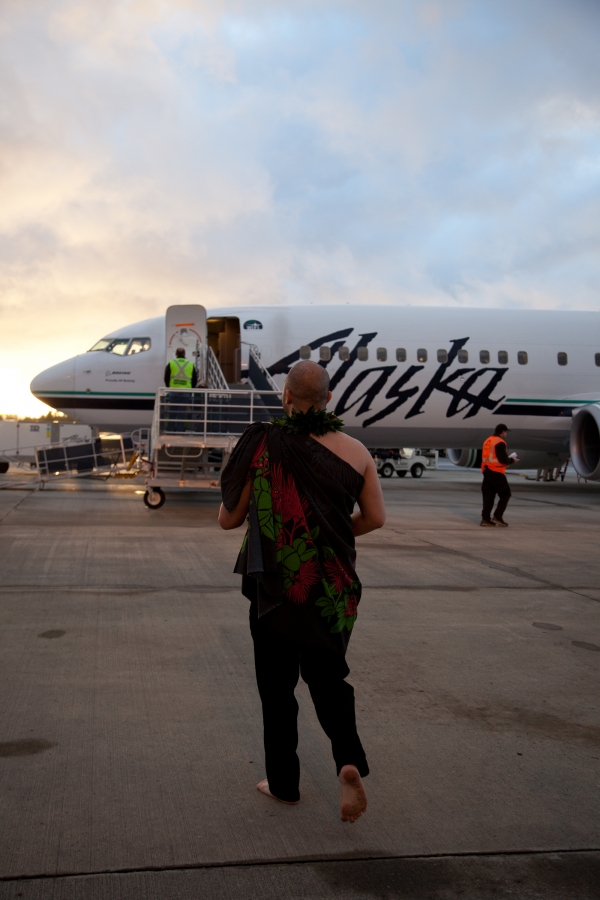 Aukai La\'amaikahiki performs a traditional Hawaiian blessing for the inaugural Alaska Airlines flight from Bellingham to Honolulu.