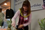 Lisa Luchau , Director, On Board Food and Beverage at Alaska Airlines greets guest with a few pre-flight refreshments and yes, pineapple was served.