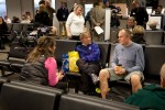 Local media interviews some travelers.