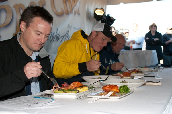 Judges eating the fish. (Photo by Tad Carlson)