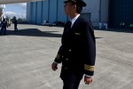 ANA pilot Yoshio Taneda performs a walk around of the new aircraft.