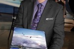 Ed Sims with keys and certificate to the plane