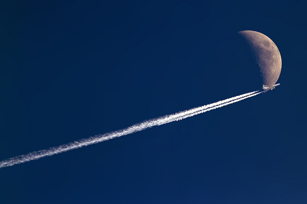 An a World MD-11 jumped over the moon. (Photo by Nick Peterman)