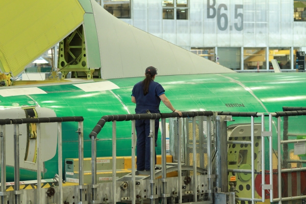 Inspecting the horizontal stabilizer. (Photo by Matt Molnar)