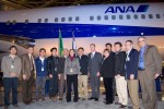 Kim Pastega with representatives of ANA in front of the plane.
