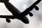 Passing the moon. (Photo by NYCAviation Staff)