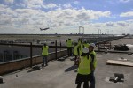 A plane is seen taking off from Runway 31L.