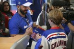 A young fan wins an autographed Marian Gaborik jersey. (Photo by Matt Molnar/NYCAviation)