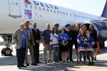 Delta crew and some select passengers to pose with Rangers legends Rod Gilbert and Ron Duguay. (Photo by Matt Molnar/NYCAviation)