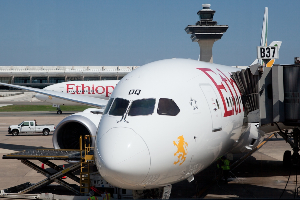 The first Ethiopian 787 Dreamliner overshadows its larger and slightly older brethren, the 777-200LR at Dulles International Airport outside of Washington DC. The 787 ran an additional special flight to Addis (ETH2501) for its delivery. (Photo by Jeremy Dwyer-Lindgren)