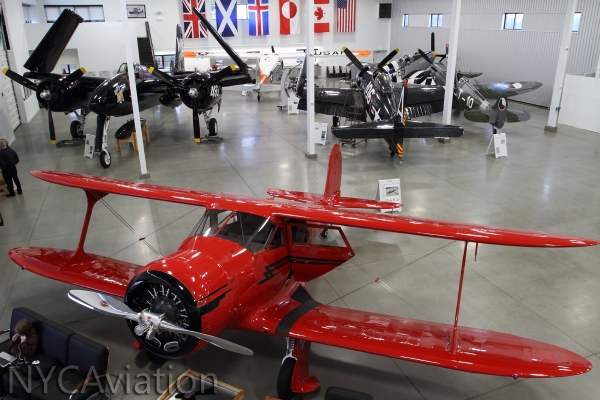 An overview of the hangar.  Counterclockwise from bottom: Staggerwing; F7 Tigercat, F8 Bearcat, Spitfire; Beaver, P-51