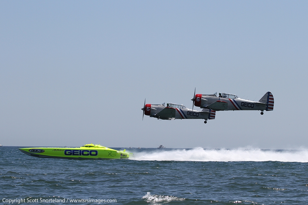 two-geico-skytypers-race-miss-geico-over-the-water-at-the-jones-beach-air-show-photo-scott-snorteland