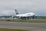 Lufthansa 747-8I takes off on a test flight. (Photo by Boeing)