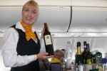 Business Class flight attendant. (Photo by Chris Sloan/Airchive.com)
