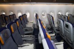 New slimline economy class seats provide 2in additional personal space. (Photo by Eric Dunetz/NYCAviation)