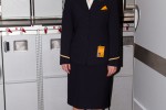 Lufthansa flight attendant, still looking chipper after over 11 hours on duty. (Photo by Eric Dunetz/NYCAviation)
