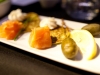 Smoked salmon with spring pea blinis and cream cheese.