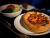 Our pre arrival meal on our afternoon flight featured a personal sized Uno's Spinach & Garlic pizza with a side salad.