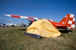 A stunning 1958 bult Piper J3C-65 Cub rests behinds its owners tent. AirVenture 2012 was dedicated to the venerable Cubs 75th Anniversary.