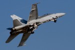 Turn and burn: the F/A 18 powers out of the missed approach making a lot of noise in the process.
