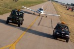 A GA plane takes pause to let our airplane pass as we taxi for departure.