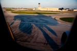 Our plane casts a warped shadow just before touching down at KMDW.