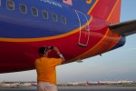 An employee takes one last shot before this year's Southwest Airventure Adventure draws to a close on a Saturday evening.