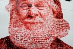 Close up of the Air Berlin Santa Claus Tour 2012 Boeing 737 (D-ABMJ). The face is a photo composite made up of 2,000 Air Berlin fans and employees. (Photo by Air Berlin)