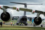 Airbus A400M Atlas is seen past the wing of an A380 on static display. (Photo by Airbus)