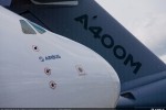 The tail of an Airbus A400M Atlas behind the nose of an Airbus A380. (Photo by Airbus)