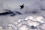 Korean Black Eagles KAI T-50 Golden Eagle jet trainer above the clouds. (Photo by Farnborough International)