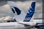 Tails of the Airbus A320 and A380. (Photo by Airbus)