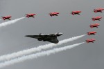 Flypast by the Avro Vulcan and Red Arrows. (Photo by Farnborough International)