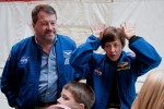 Former shuttle astronauts Nicholas Patrick (L) and Wendy Lawrence (R) speak to kids in the payload bay, explaing about the lights on astronaut helmets. (Photo by Jeremy Dwyer-Lindgren/NYCAviation)
