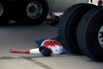 A volunteer lying under the simulated aircraft.