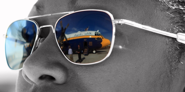 A Navy Airman gazes at our ride, the C-130 they call Fat Albert.