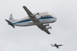 When it arrived in the Seattle area, the Super Guppy performed a pass over the Boeing Field runway escorted by Clay Lacy in his Learjet 35. (Photo by Liem Bahneman/NYCAviation)