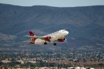 One of Virgin’s A319s, N524VA, lifts off from LAS as flight 770 to SFO. (Photo by gTarded)
