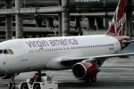 N624VA gets pushed back at SFO. (Photo by Quinn Norton)