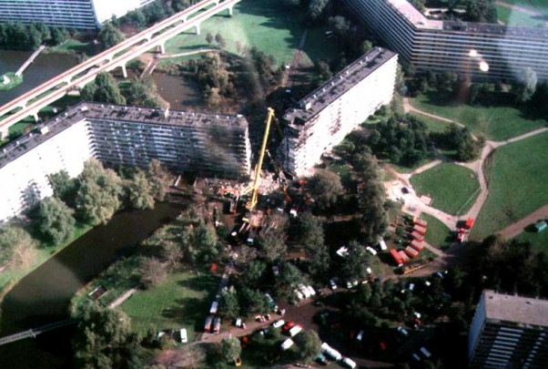 A 747 freighter being flown by El Al crashed into this apartment complex in Amsterdam, killing 39 on the ground in addition to the 4 on-board.