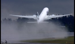 A Cathay Pacific Boeing 777-300ER takes off from Washington on a delivery flight. (Photo by Jeremy Dwyer-Lindgren)