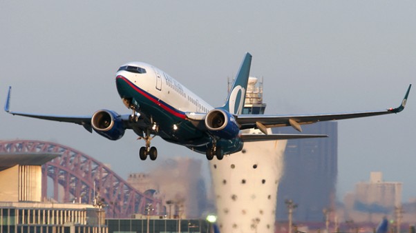 AirTran 737-700 departing off of runway 13 at LaGuardia Airport