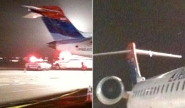 Delta Connection CRJ appears to have suffered damage to its vertical stabilizer and left horizontal stabilizer