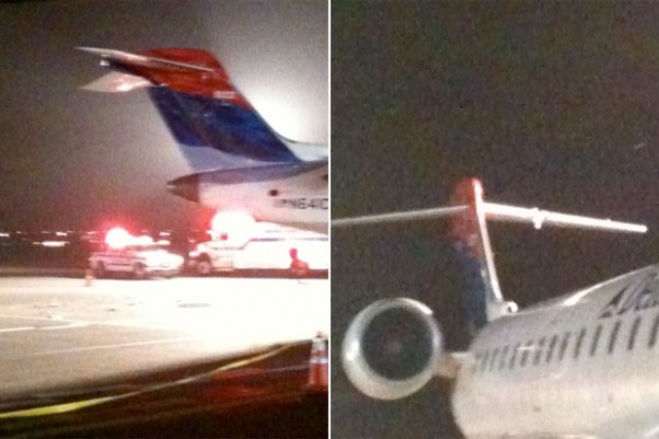 Delta Connection CRJ appears to have suffered damage to its vertical stabilizer and left horizontal stabilizer